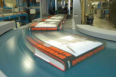Quality case bound books in the manufacturing process at Thomson-Shore.